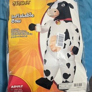 Never worn Spirit Halloween Black and White Inflatable Cow Costume